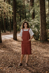 Jade linen apron dress in Terracotta