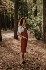 Jade linen apron dress in Terracotta