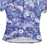 SHE BEEST Womens Blue & Purple Floral Graphic T-Shirt S Short Sleeve Zip Neck