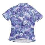 SHE BEEST Womens Blue & Purple Floral Graphic T-Shirt S Short Sleeve Zip Neck