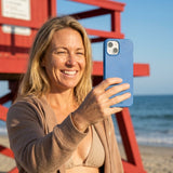 Electric Blue iPhone 14 Case - Lifestyle photo showing phone case in use