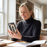 Black Cassette iPhone 14 Case - Lifestyle photo showing phone case in use