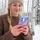 Lavender Blue Reflections iPhone 15 Pro Case - Lifestyle photo showing phone case in use