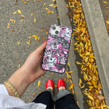 Black Spellbound Ghouls iPhone 15 Pro Case - Lifestyle photo showing phone case in use
