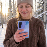 Lavender Blue Reflections Samsung Galaxy S25 Case - Lifestyle photo showing phone case in use