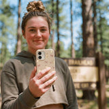 Seashell Purrfect iPhone 15 Case - Lifestyle photo showing phone case in use