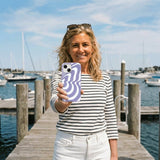 Lavender Flutter Right iPhone 14 Case - Lifestyle photo showing phone case in use