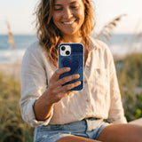 Powder Blue Denim Heart iPhone 15 Pro Case - Lifestyle photo showing phone case in use