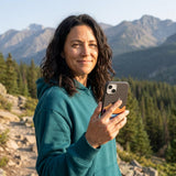 Black Night Trails iPhone 14 Case - Lifestyle photo showing phone case in use