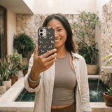 Black Beagle Buds iPhone 15 Case - Lifestyle photo showing phone case in use