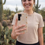 Seashell Corgi Cuties Samsung Galaxy S25 Case - Lifestyle photo showing phone case in use