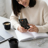 Black Galactic Glow Google Pixel 7 Case - Lifestyle photo showing phone case in use