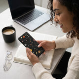 Black Galactic Glow Google Pixel 8 Pro Case - Lifestyle photo showing phone case in use