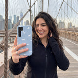 Powder Blue Lil Dinos Samsung Galaxy S25 Case - Lifestyle photo showing phone case in use