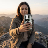 Black Vintage Camera iPhone 15 Case - Lifestyle photo showing phone case in use