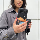 Black Night Trails Google Pixel 8a Case - Lifestyle photo showing phone case in use