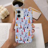 Powder Blue Sails and Seagulls iPhone 15 Pro Case - Lifestyle photo showing phone case in use
