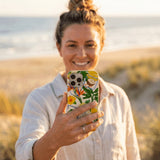 Seashell Tropics iPhone 15 Case - Lifestyle photo showing phone case in use