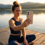 Seashell Feeling Peachy iPhone 15 Pro Case - Lifestyle photo showing phone case in use