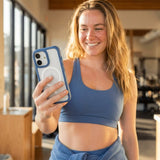 Clear iPhone 16 Pro Max Case with Sage Green Ridge - Lifestyle photo showing phone case in use