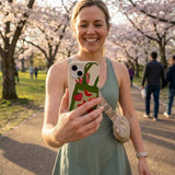 Seashell Market Tote iPhone 14 Case - Lifestyle photo showing phone case in use