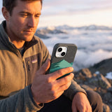 Black Boreal iPhone 16 Pro Case - Lifestyle photo showing phone case in use