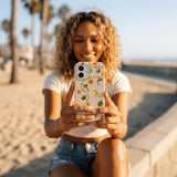 Seashell Island Charms iPhone 15 Case - Lifestyle photo showing phone case in use
