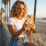 Seashell Island Charms iPhone 14 Case - Lifestyle photo showing phone case in use