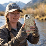 London Fog Camp Pela iPhone 14 Case - Lifestyle photo showing phone case in use