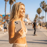 Seashell Seashore iPhone 16 Case - Lifestyle photo showing phone case in use