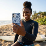 Powder Blue Marine Life iPhone 16 Case - Lifestyle photo showing phone case in use