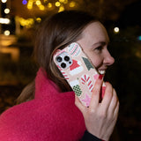 Seashell Festive Cookies iPhone 16 Pro Max Case - Lifestyle photo showing phone case in use