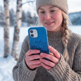 Electric Blue Backcountry Ski iPhone 14 Case - Lifestyle photo showing phone case in use