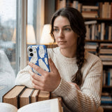 Electric Blue Snowy Owls iPhone 16 Pro Max Case - Lifestyle photo showing phone case in use