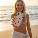 Seashell Cardinals iPhone 16 Case - Lifestyle photo showing phone case in use