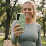 Sage Green Green Oasis Samsung Galaxy S25 Case - Lifestyle photo showing phone case in use