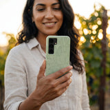 Sage Green Cacti Samsung Galaxy S25 Case - Lifestyle photo showing phone case in use