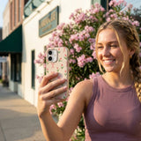 Seashell Tulip Bliss iPhone 16 Pro Max Case - Lifestyle photo showing phone case in use
