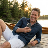 Black Play Sketch iPhone 14 Case - Lifestyle photo showing phone case in use