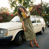 Seashell Spaghetti Splash iPhone 14 Case - Lifestyle photo showing phone case in use