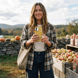 Seashell Noodle Fiesta iPhone 16 Case - Lifestyle photo showing phone case in use