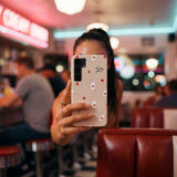 Seashell Lucky You Samsung Galaxy S25 Case - Lifestyle photo showing phone case in use