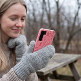 Bubblegum Pink Festive Forest Samsung Galaxy S25 Case - Lifestyle photo showing phone case in use