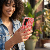 Bubblegum Pink Heatwave Samsung Galaxy S25 Case - Lifestyle photo showing phone case in use