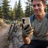 London Fog Changing Gears MTBCO Samsung Galaxy S25 Case - Lifestyle photo showing phone case in use