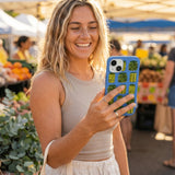 Electric Blue Pickling Pickles iPhone 14 Case - Lifestyle photo showing phone case in use