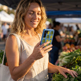 Electric Blue Pickling Pickles Samsung Galaxy S25 Case - Lifestyle photo showing phone case in use