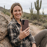 Chocolate Brown Desert Run Samsung Galaxy S25 Case - Lifestyle photo showing phone case in use