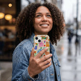 Seashell Pup Bloom iPhone 14 Case - Lifestyle photo showing phone case in use