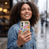 Seashell Pup Bloom iPhone 16 Case - Lifestyle photo showing phone case in use